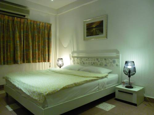 Imagen de la habitación del Hotel Swiss Food Restaurant And. Foto 7