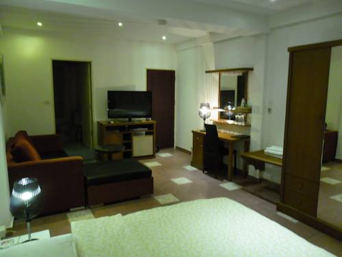 Imagen de la habitación del Hotel Swiss Food Restaurant And. Foto 8