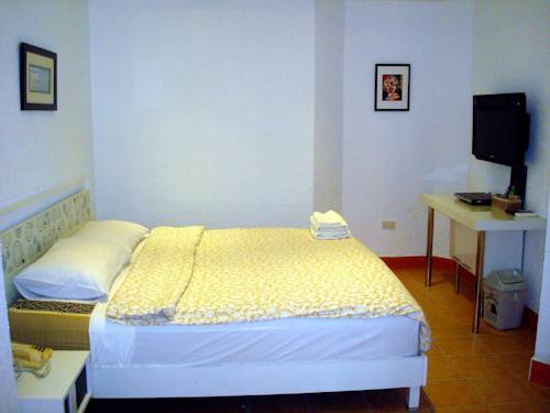Imagen de la habitación del Hotel Swiss Food Restaurant And. Foto 11