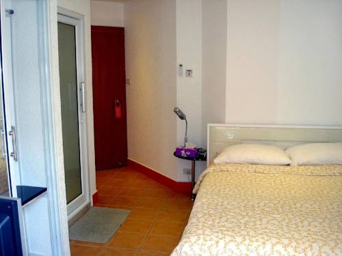 Imagen de la habitación del Hotel Swiss Food Restaurant And. Foto 14