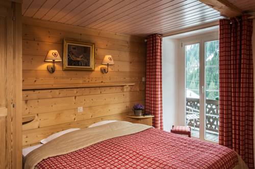 Imagen de la habitación del Hotel Swiss Historic Hotel du Pillon. Foto 3