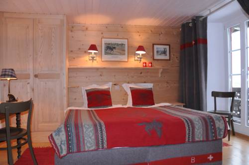 Imagen de la habitación del Hotel Swiss Historic Hotel du Pillon. Foto 4