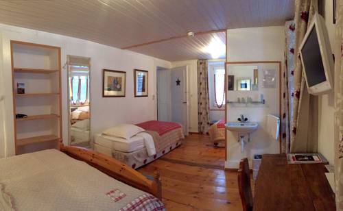 Imagen de la habitación del Hotel Swiss Historic Hotel du Pillon. Foto 12