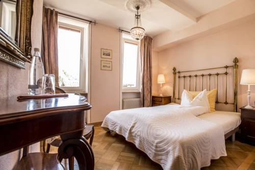 Imagen de la habitación del Hotel Swiss Historic & Garten Villa Carona. Foto 9
