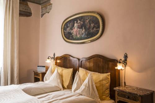 Imagen de la habitación del Hotel Swiss Historic & Garten Villa Carona. Foto 11