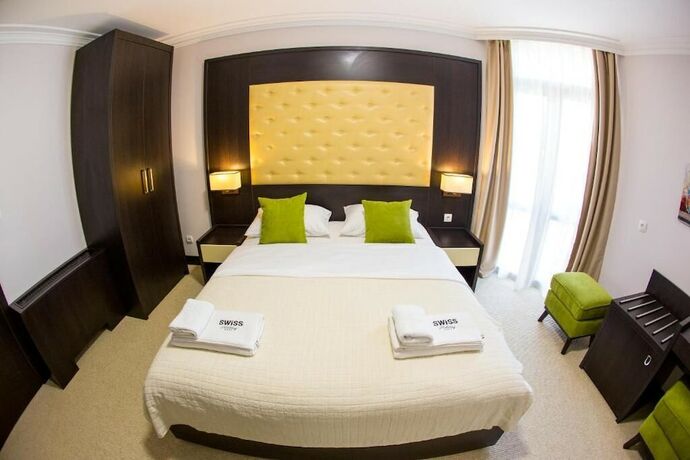Imagen de la habitación del Hotel Swiss Holiday. Foto 12