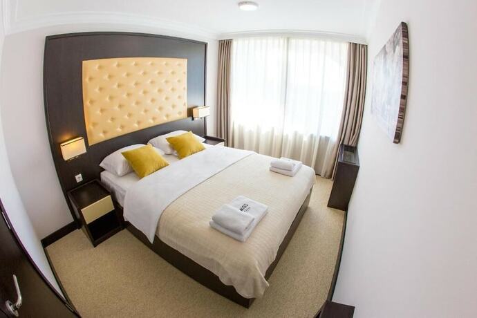 Imagen de la habitación del Hotel Swiss Holiday. Foto 13