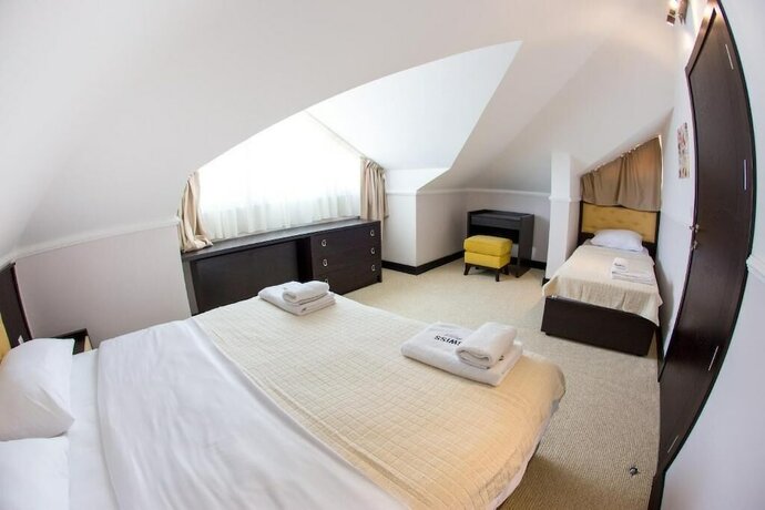 Imagen de la habitación del Hotel Swiss Holiday. Foto 14