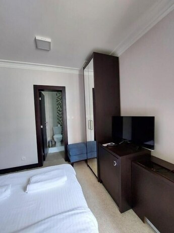Imagen de la habitación del Hotel Swiss Holiday. Foto 20