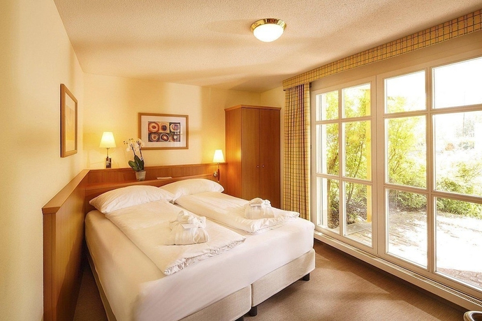 Imagen de la habitación del Hotel Swiss Holiday Park Resort. Foto 9