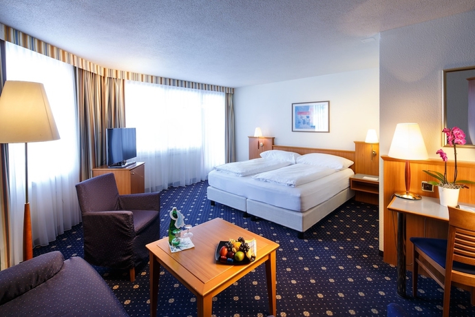 Imagen de la habitación del Hotel Swiss Holiday Park Resort. Foto 13