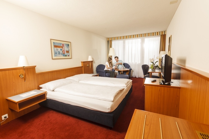 Imagen de la habitación del Hotel Swiss Holiday Park Resort. Foto 15