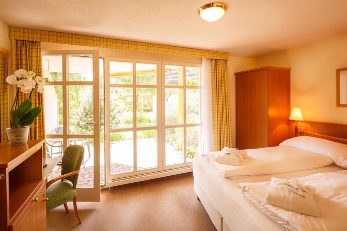 Imagen de la habitación del Hotel Swiss Holiday Park Resort. Foto 17