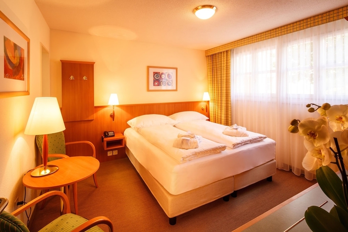 Imagen de la habitación del Hotel Swiss Holiday Park Resort. Foto 18
