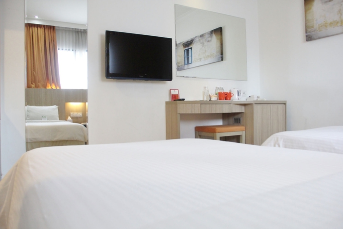 Imagen de la habitación del Hotel Swiss Inn Chinatown Kuala Lumpur. Foto 11