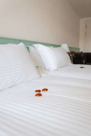 Imagen de la habitación del Hotel Swiss La Couronne. Foto 12