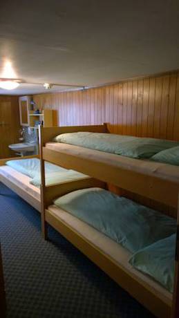 Imagen de la habitación del Hotel Swiss Lodge Bernerhof. Foto 5