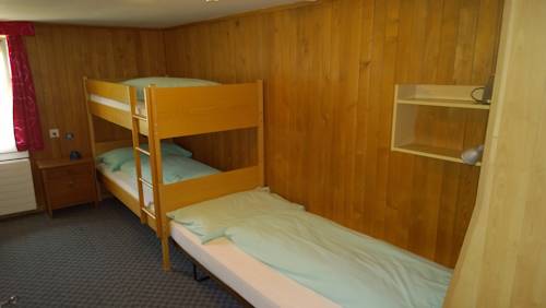 Imagen de la habitación del Hotel Swiss Lodge Bernerhof. Foto 6