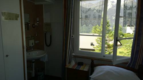 Imagen de la habitación del Hotel Swiss Lodge Bernerhof. Foto 8