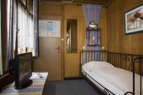 Imagen de la habitación del Hotel Swiss Lodge Bernerhof. Foto 14