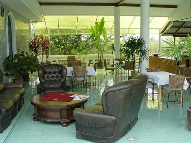 Imagen del bar/restaurante del Hotel Swiss Orchid Private Bungalow Resort. Foto 2