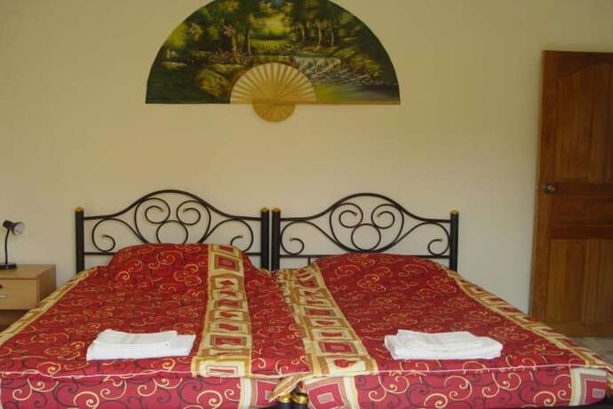 Imagen de la habitación del Hotel Swiss Orchid Private Bungalow Resort. Foto 3