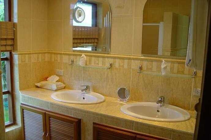 Imagen de la habitación del Hotel Swiss Orchid Private Bungalow Resort. Foto 4
