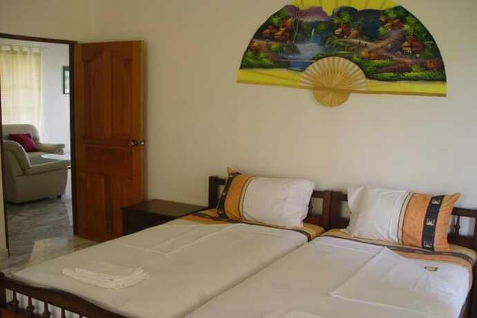 Imagen de la habitación del Hotel Swiss Orchid Private Bungalow Resort. Foto 5