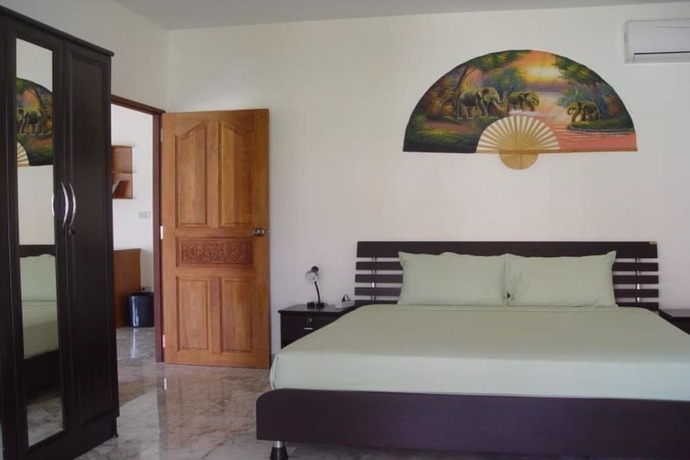 Imagen de la habitación del Hotel Swiss Orchid Private Bungalow Resort. Foto 8