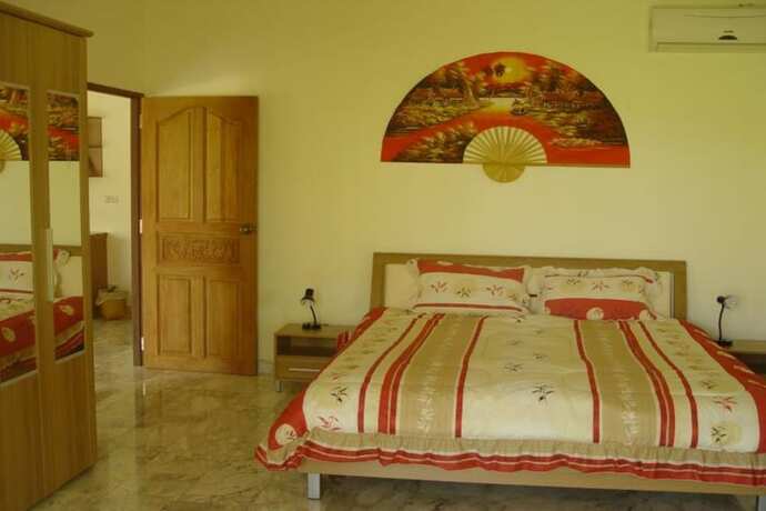 Imagen de la habitación del Hotel Swiss Orchid Private Bungalow Resort. Foto 9