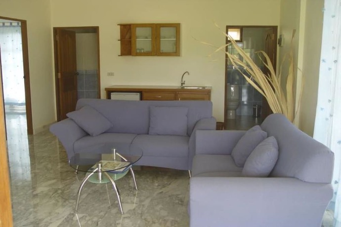 Imagen de la habitación del Hotel Swiss Orchid Private Bungalow Resort. Foto 10