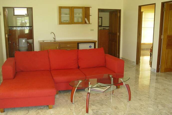 Imagen de la habitación del Hotel Swiss Orchid Private Bungalow Resort. Foto 11