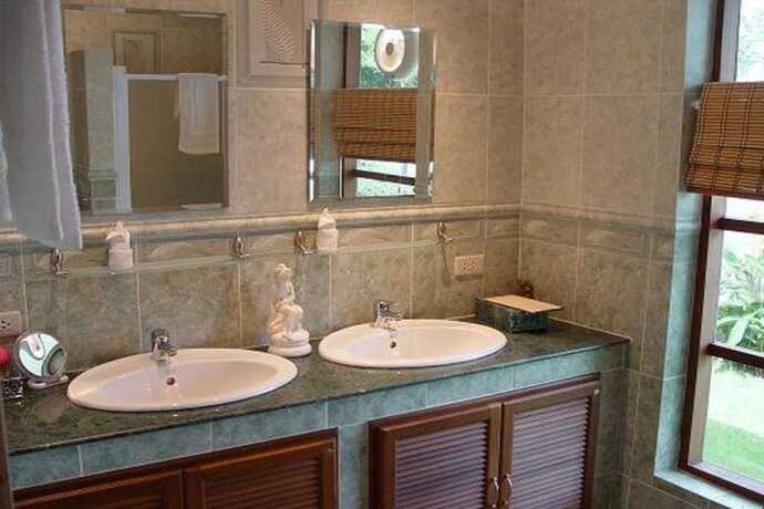 Imagen de la habitación del Hotel Swiss Orchid Private Bungalow Resort. Foto 17