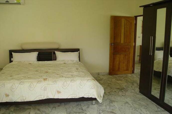 Imagen de la habitación del Hotel Swiss Orchid Private Bungalow Resort. Foto 18