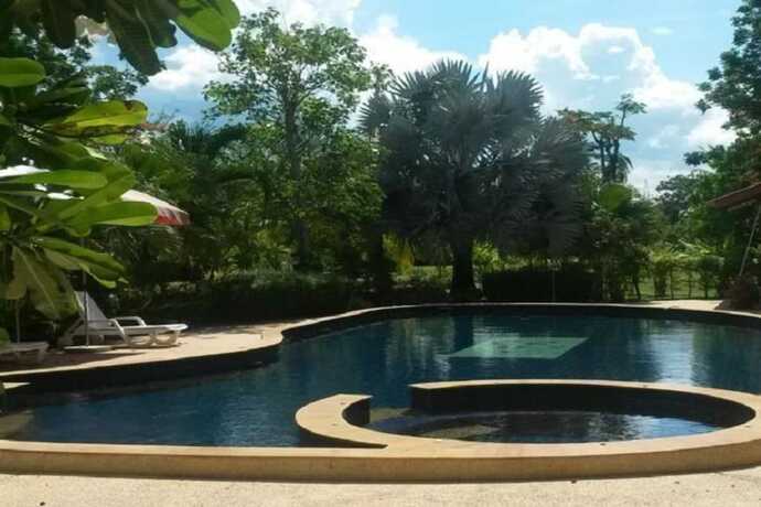 Imagen de la piscina del Hotel Swiss Orchid Private Bungalow Resort. Foto 19