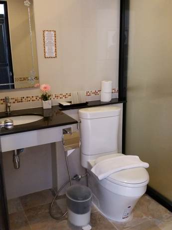 Imagen de la habitación del Hotel Swiss Paradise Boutique Villa. Foto 11