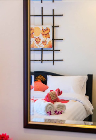 Imagen de la habitación del Hotel Swiss Paradise Boutique Villa. Foto 14