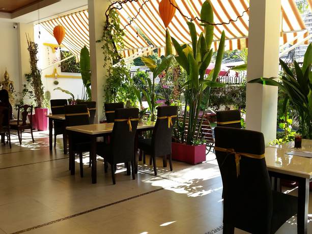 Imagen del bar/restaurante del Hotel Swiss Paradise Boutique Villa. Foto 2