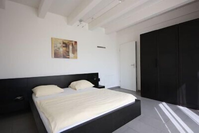 Imagen de la habitación del Hotel Swiss Star District 11. Foto 8