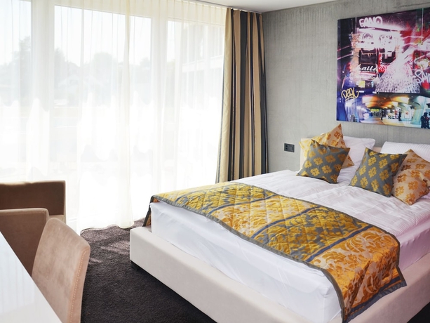 Imagen de la habitación del Hotel Swiss Star. Foto 2