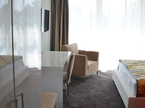 Imagen de la habitación del Hotel Swiss Star. Foto 12