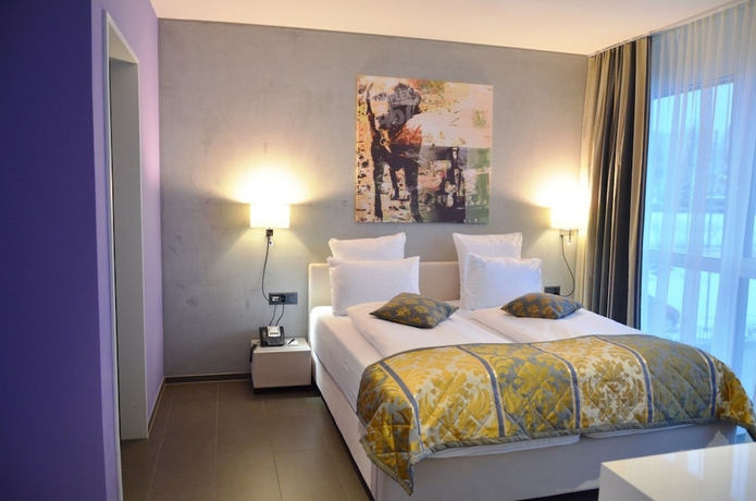 Imagen de la habitación del Hotel Swiss Star. Foto 17