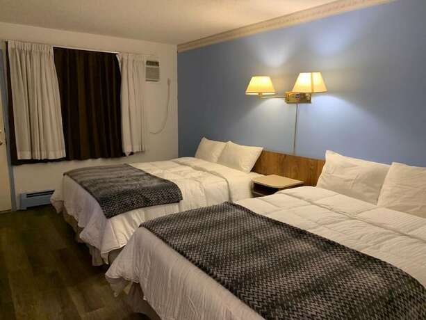 Imagen de la habitación del Hotel Swiss Sunset Inn. Foto 20