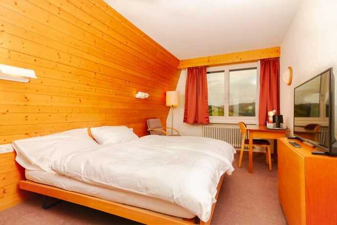 Imagen de la habitación del Hotel Swiss Views. Foto 11