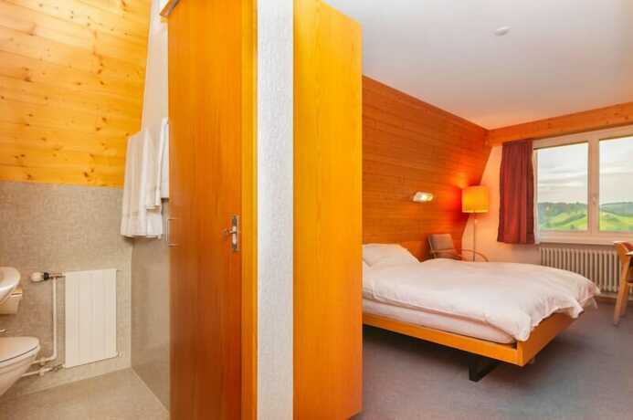 Imagen de la habitación del Hotel Swiss Views. Foto 17