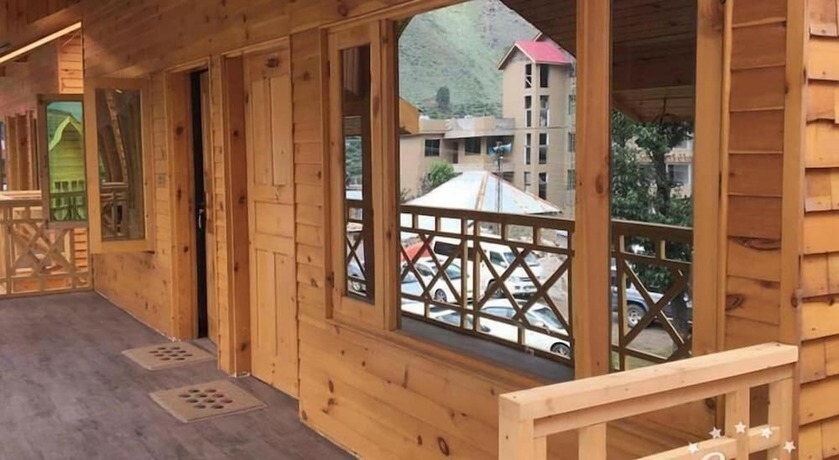 Imagen general del Hotel Swiss Wood Cottages. Foto 11