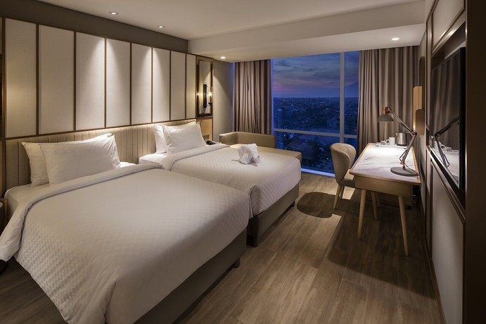 Imagen de la habitación del Hotel Swiss-Belhotel Solo. Foto 6