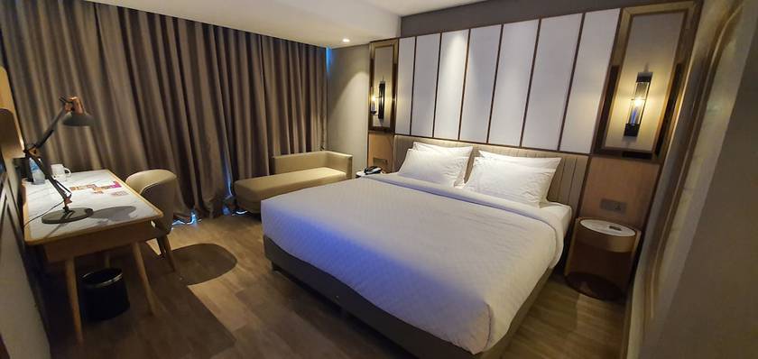 Imagen de la habitación del Hotel Swiss-Belhotel Solo. Foto 13