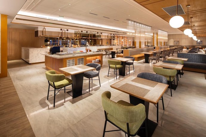 Imagen del bar/restaurante del Hotel Swiss-Belhotel Solo. Foto 3