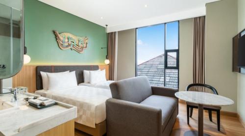 Imagen de la habitación del Hotel Swiss-Belinn Indramayu. Foto 15